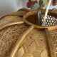 Suspension made of rattan and wicker