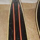 Old skis wooden and its pair of sticks
