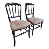Pair of antique Napoleon III chairs in blackened wood and fabric