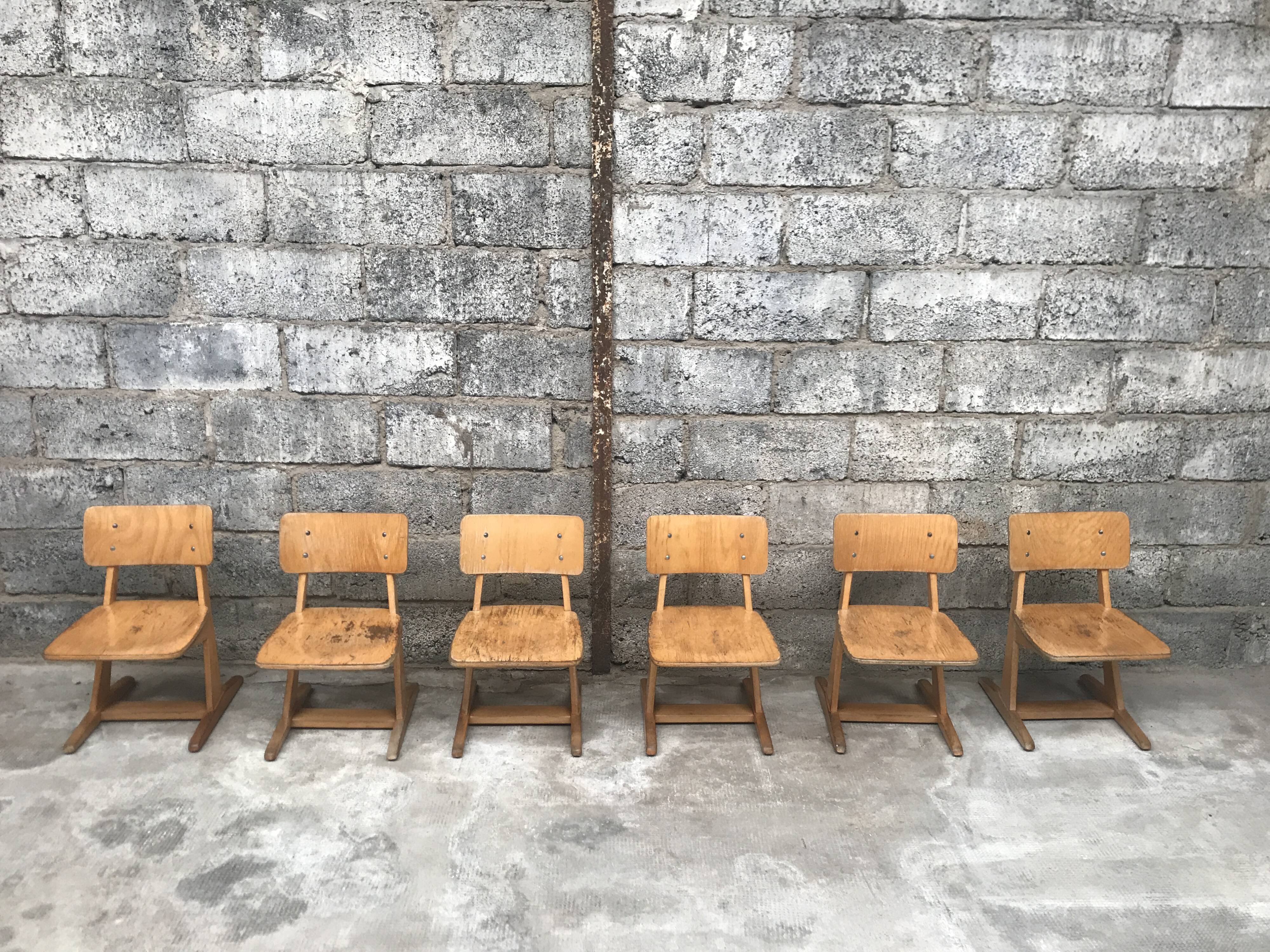Series of 10 casala children's chairs in vintage light wood