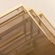 Set of three brass nesting tables in the style of Romeo Rega, Italy, 1970s