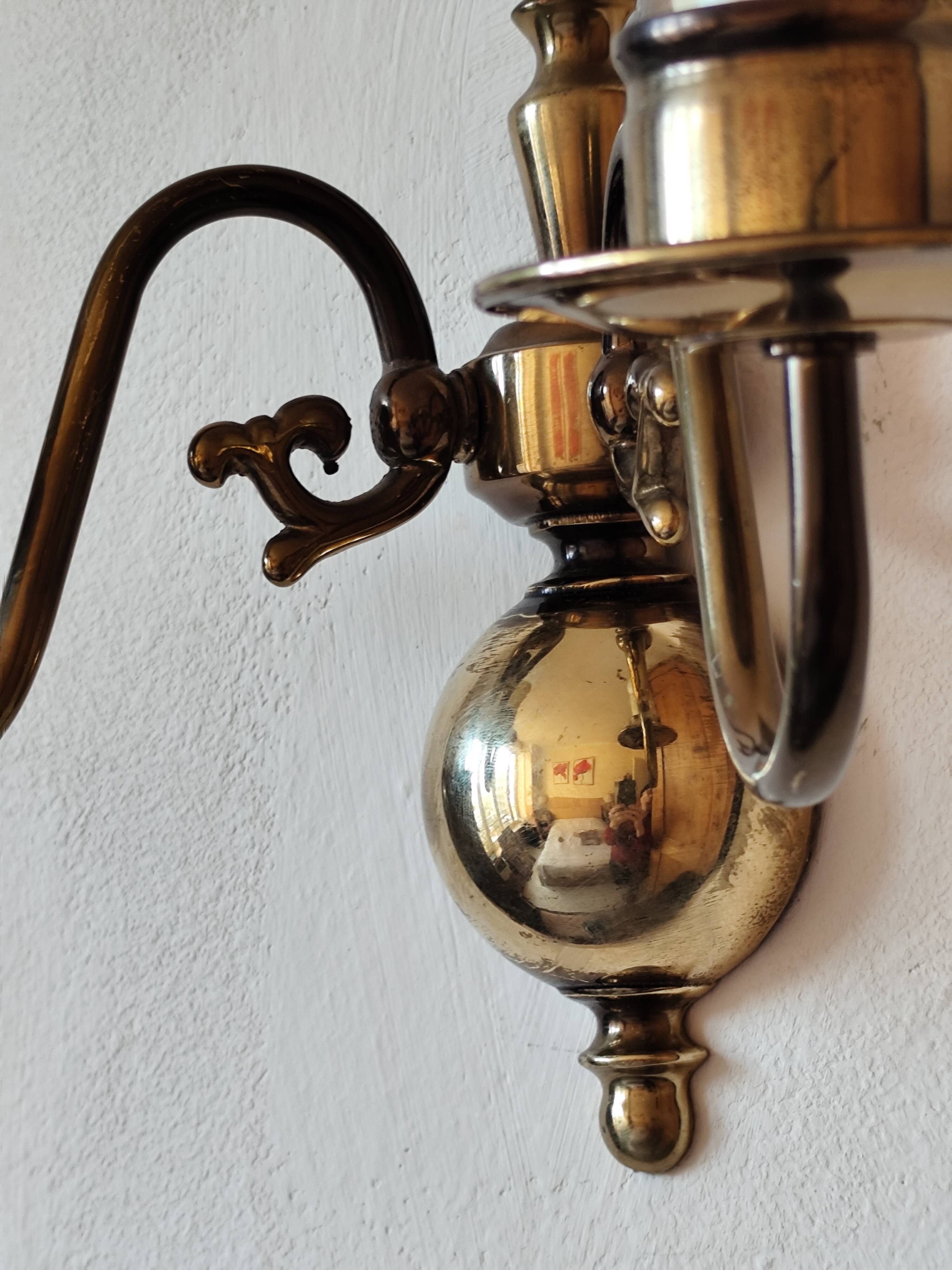 Pair of Dutch style 2-light brass wall lights