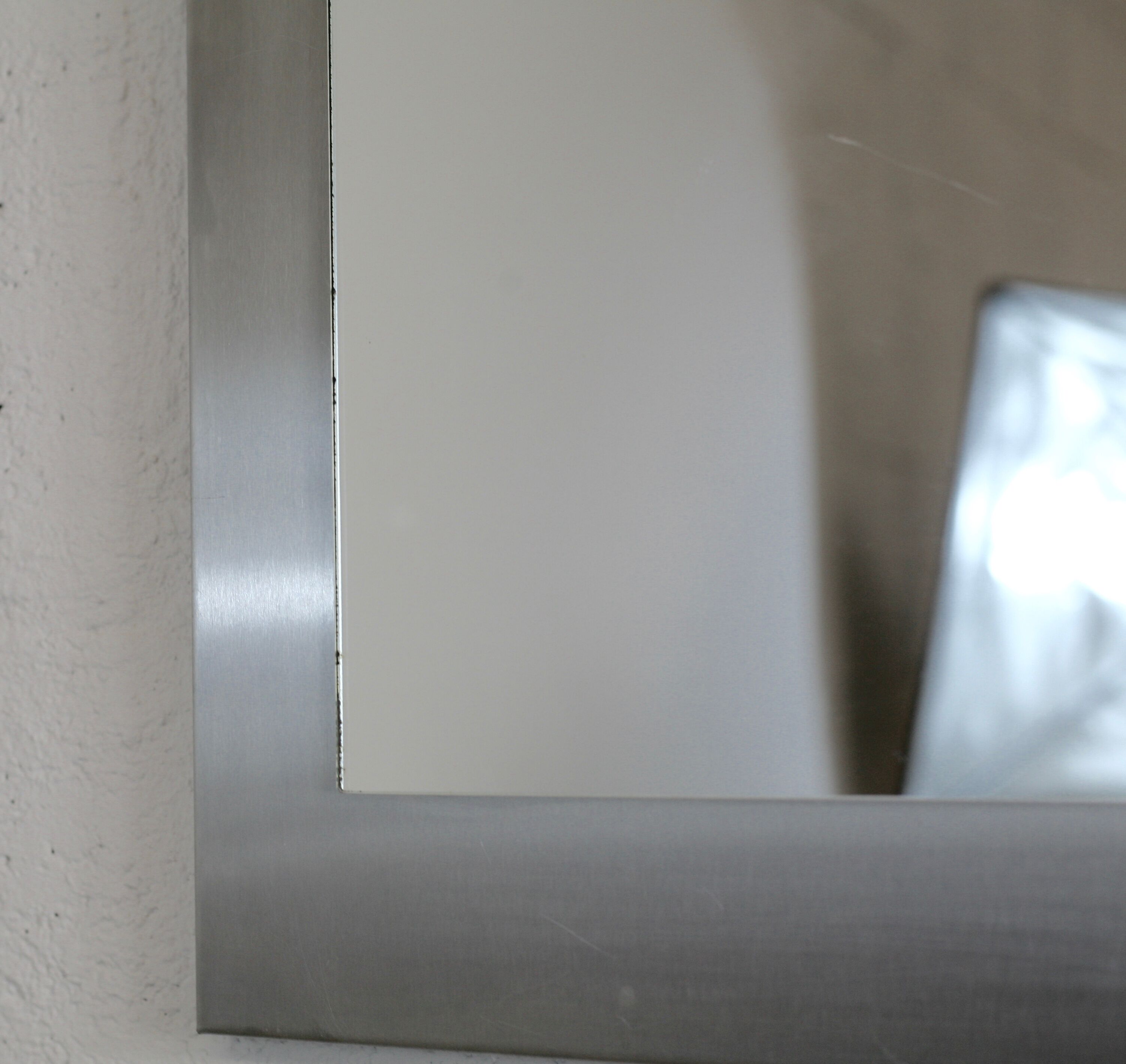 Mirror "space age". Stainless steel. France, circa 1970