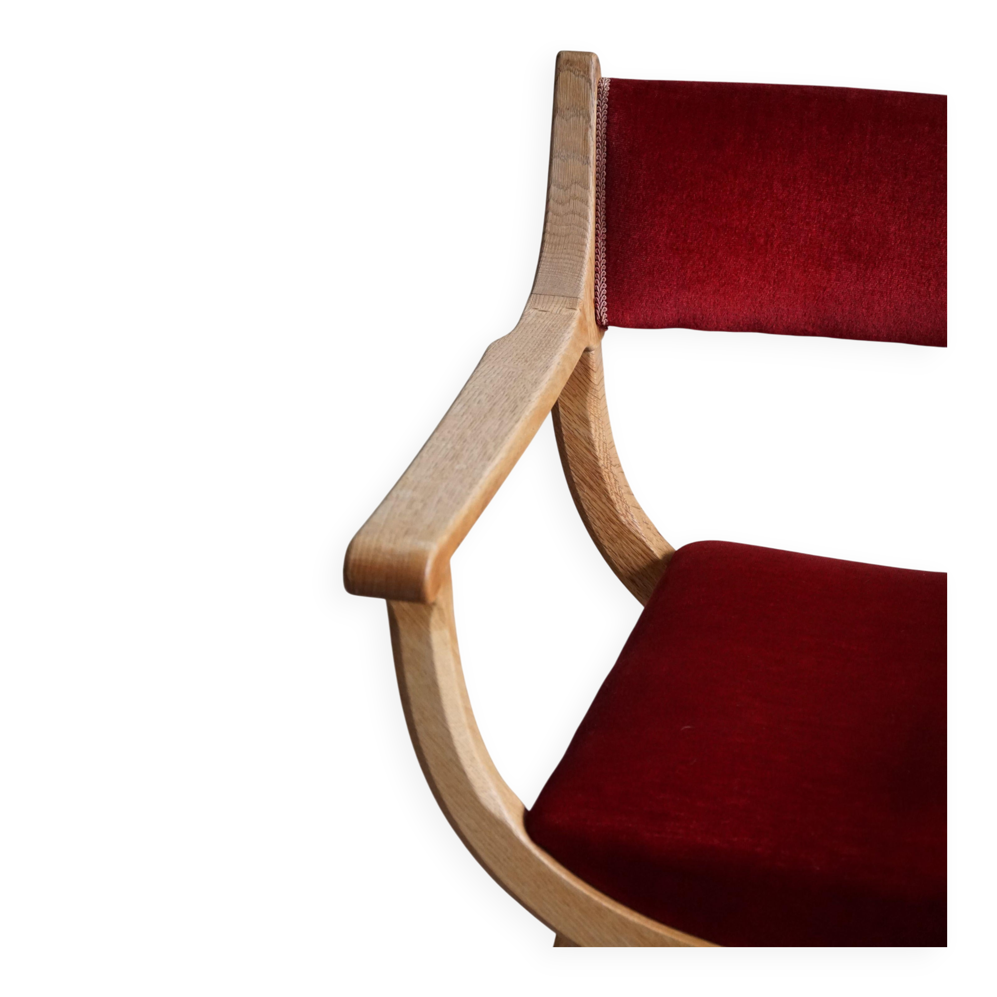 Henning Kjærnulf, Oak and velvet armchair, Model "Kurul", Mid-century, 1960s