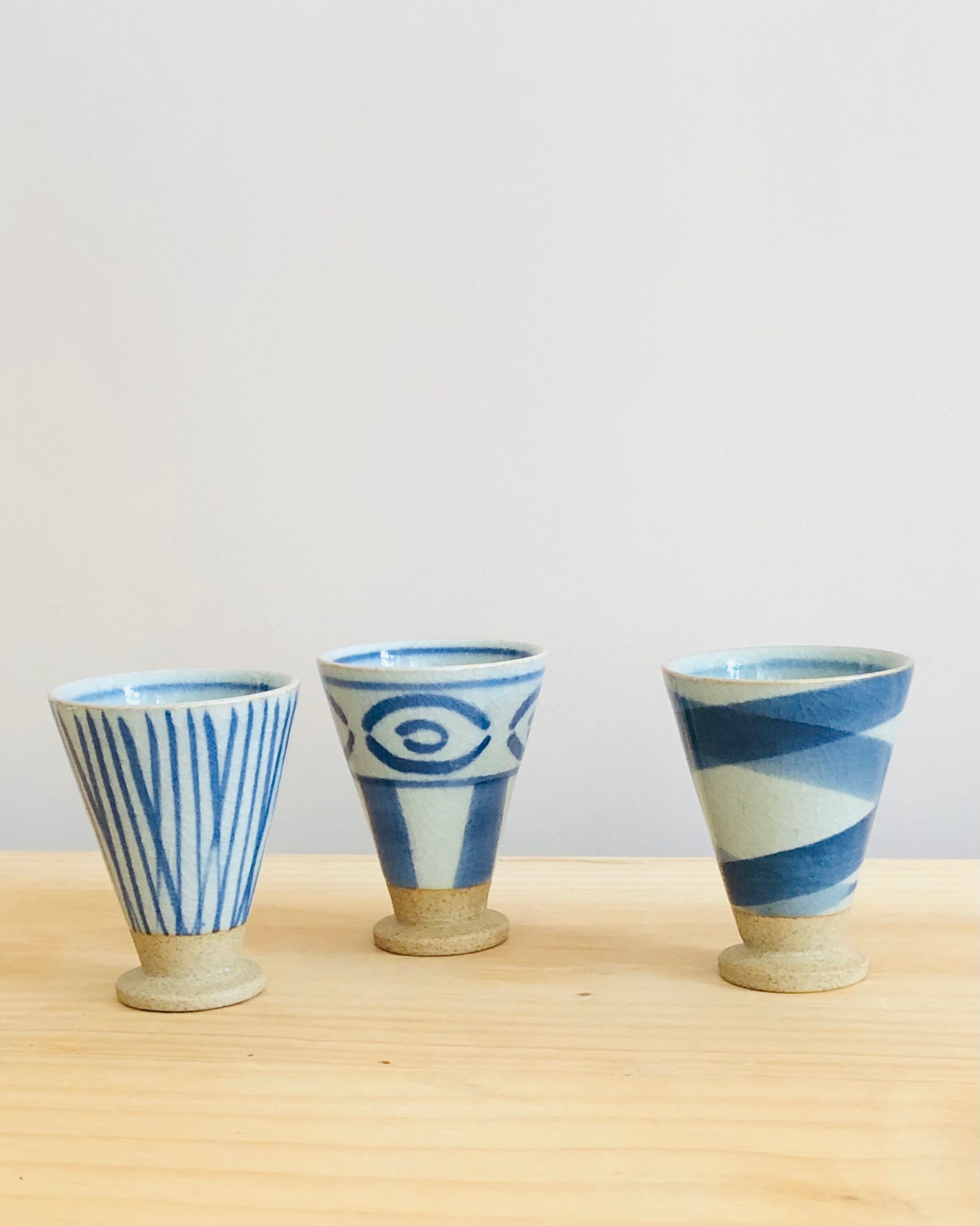Set of 3 hand-painted sandstone sake cups