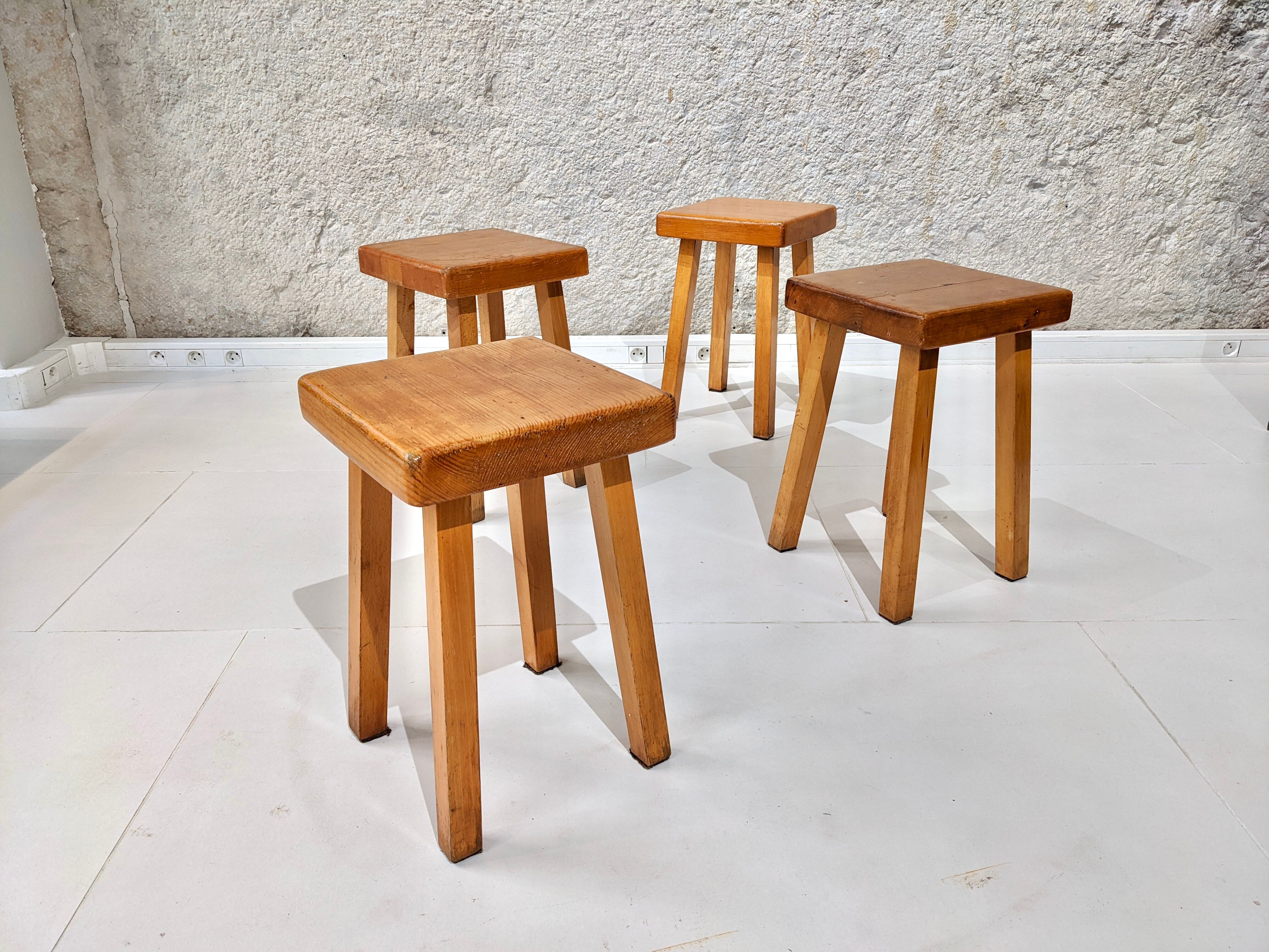 Set of 4 pine wood stools by Charlotte Perriand for Les Arcs 1800