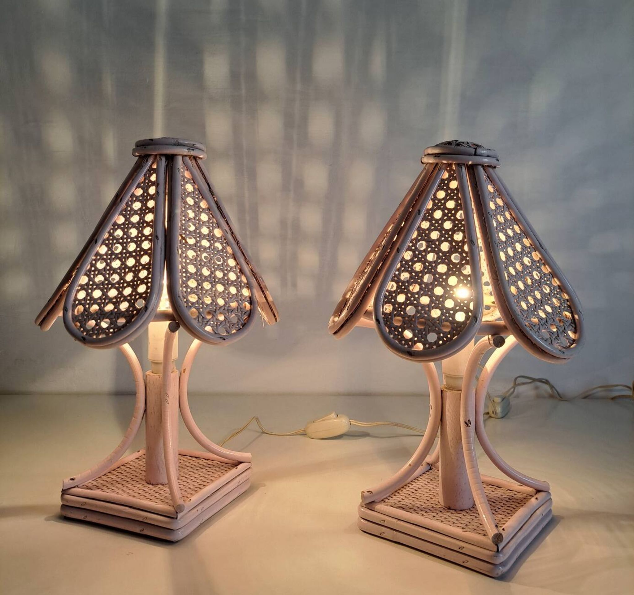 Pair of cane and bamboo bedside lamps