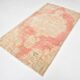 Tapis vintage oriental rouge et saumon