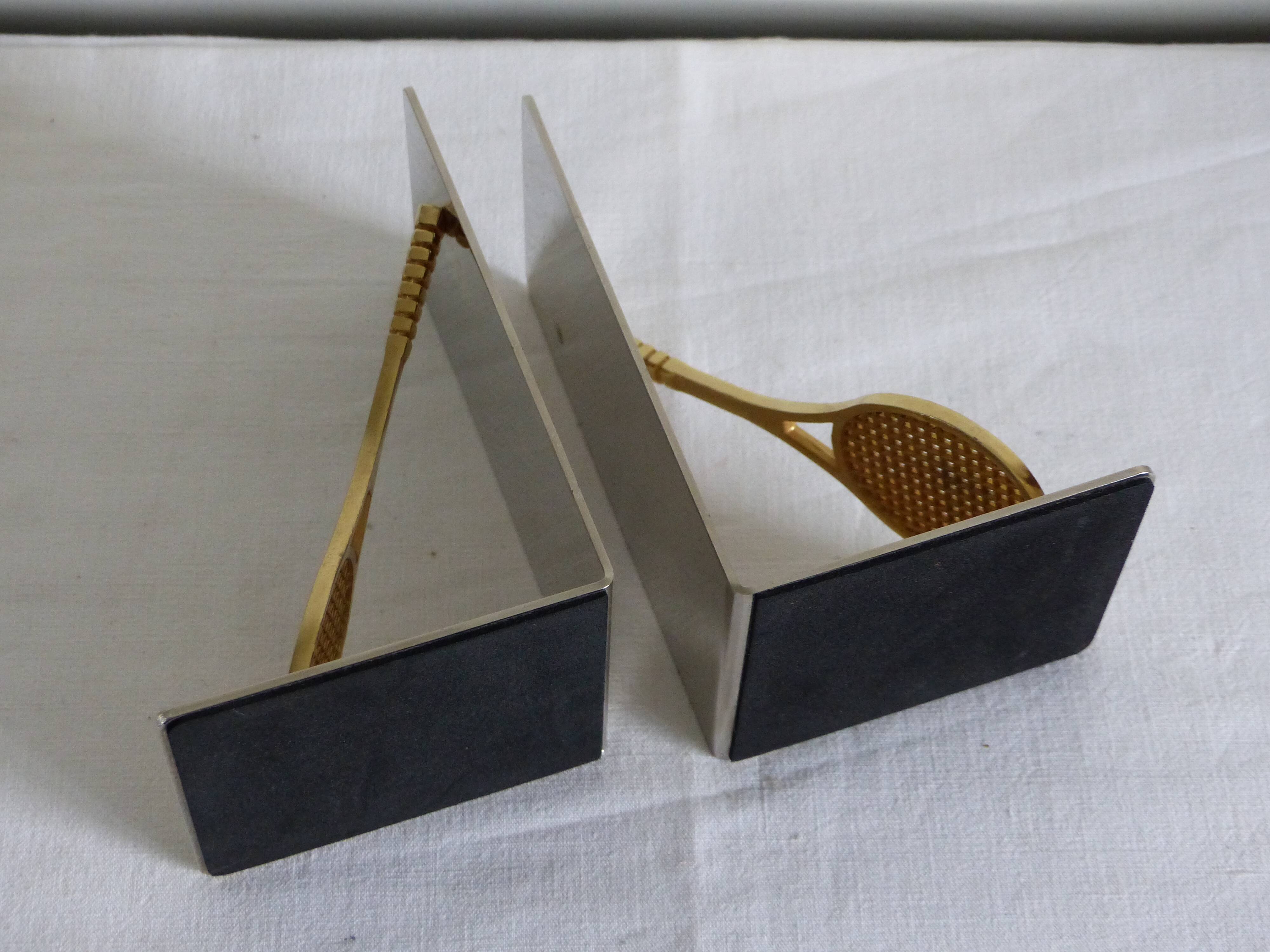 Pair of bookends, tennis racket.