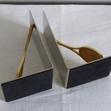 Pair of bookends, tennis racket.