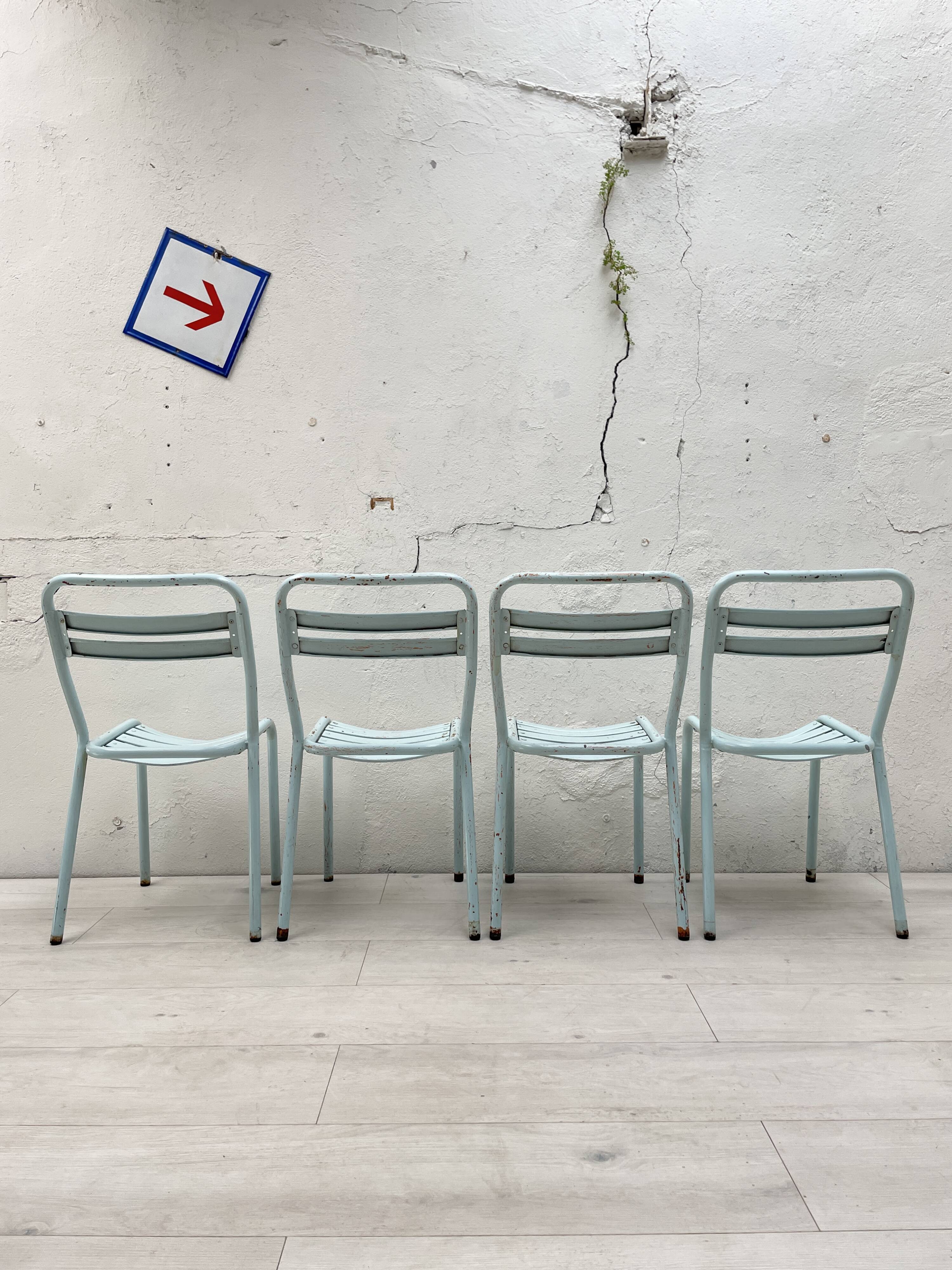 Set of four Tolix T2 chairs, circa 1950.