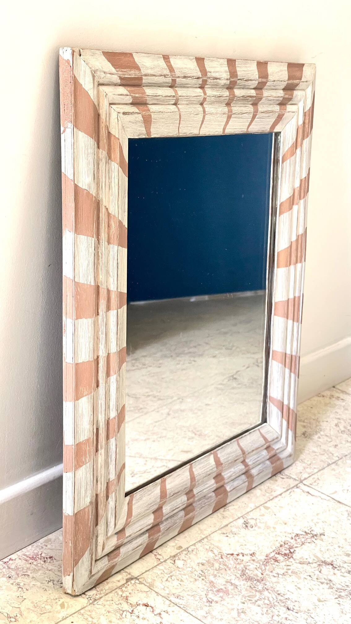 Old mirror in hand-painted wood