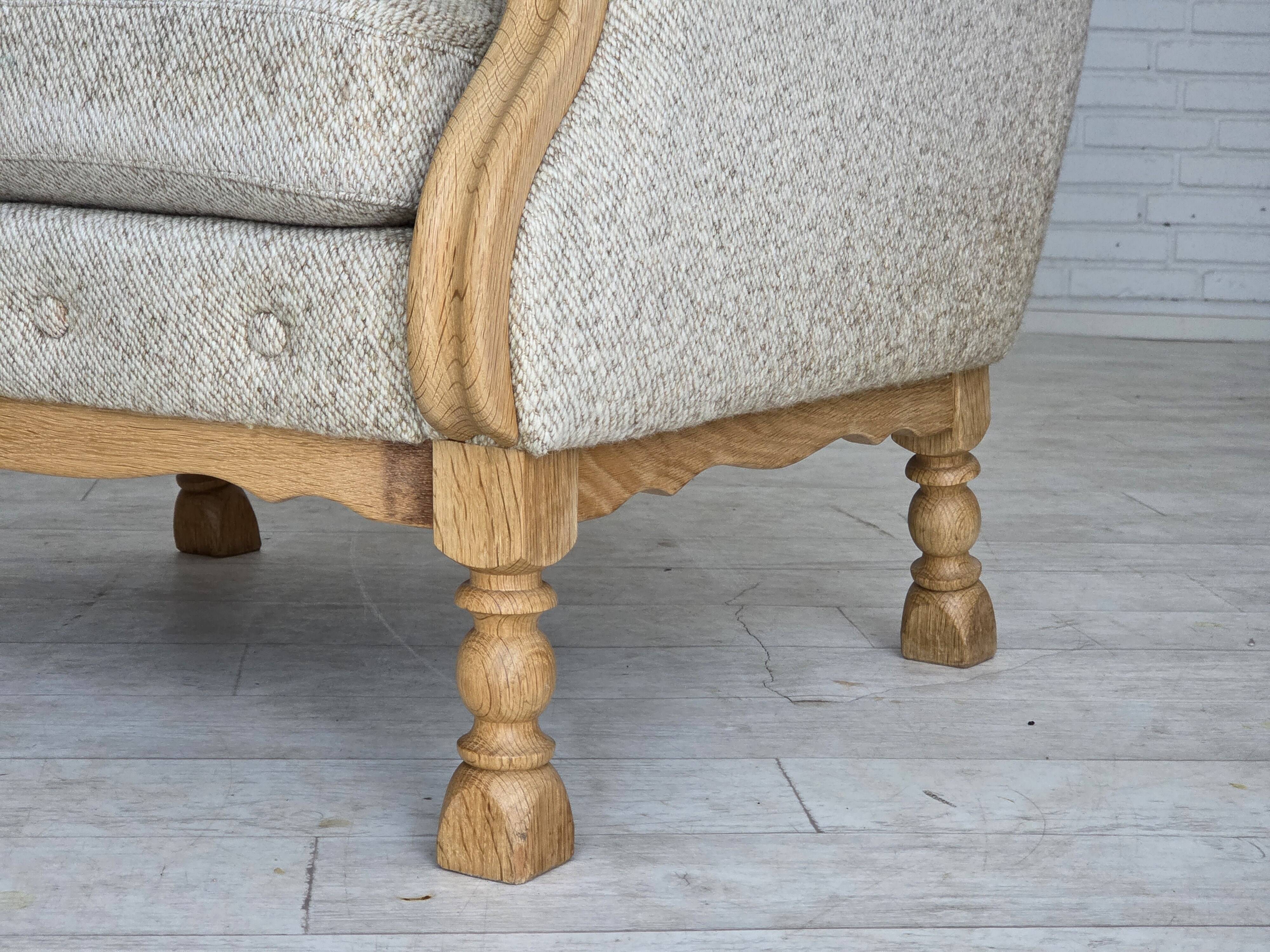 1970s, Danish highback armchair, furniture wool, solid oak wood.