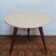 Vintage tripod side table in wood and formica.