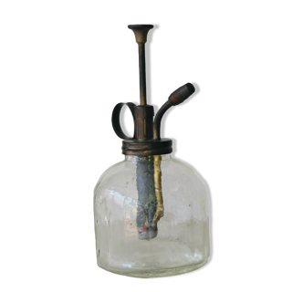 Glass and brass spray