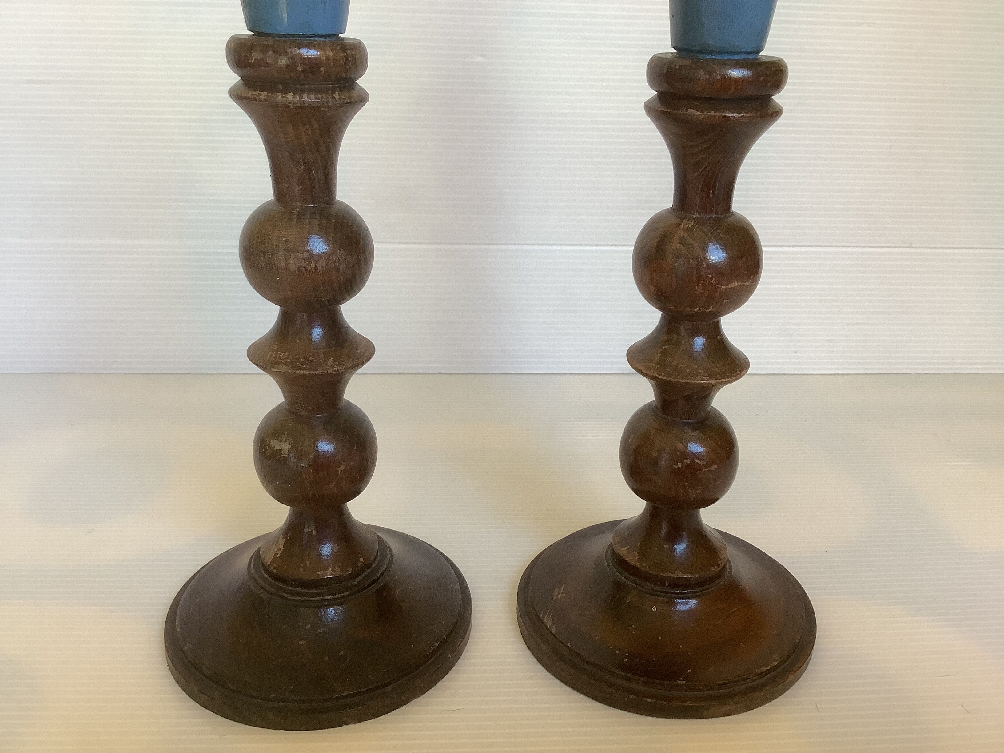 Pair of old candlesticks wood candles dummy blue wood