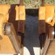 Fauteuils en bois et cuir capitonné, les 2