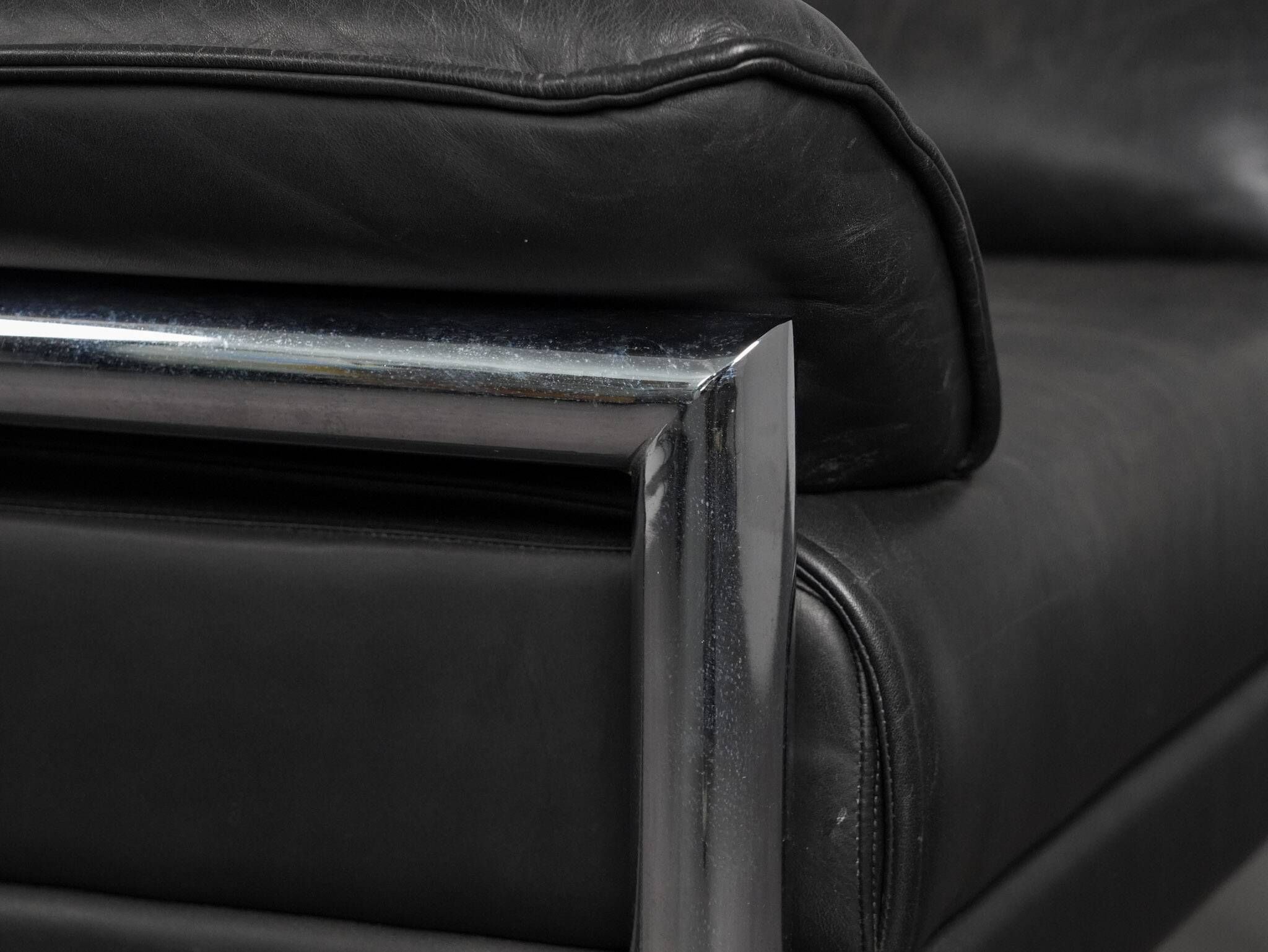Leather and chrome lounge chair, Italy, 1990s