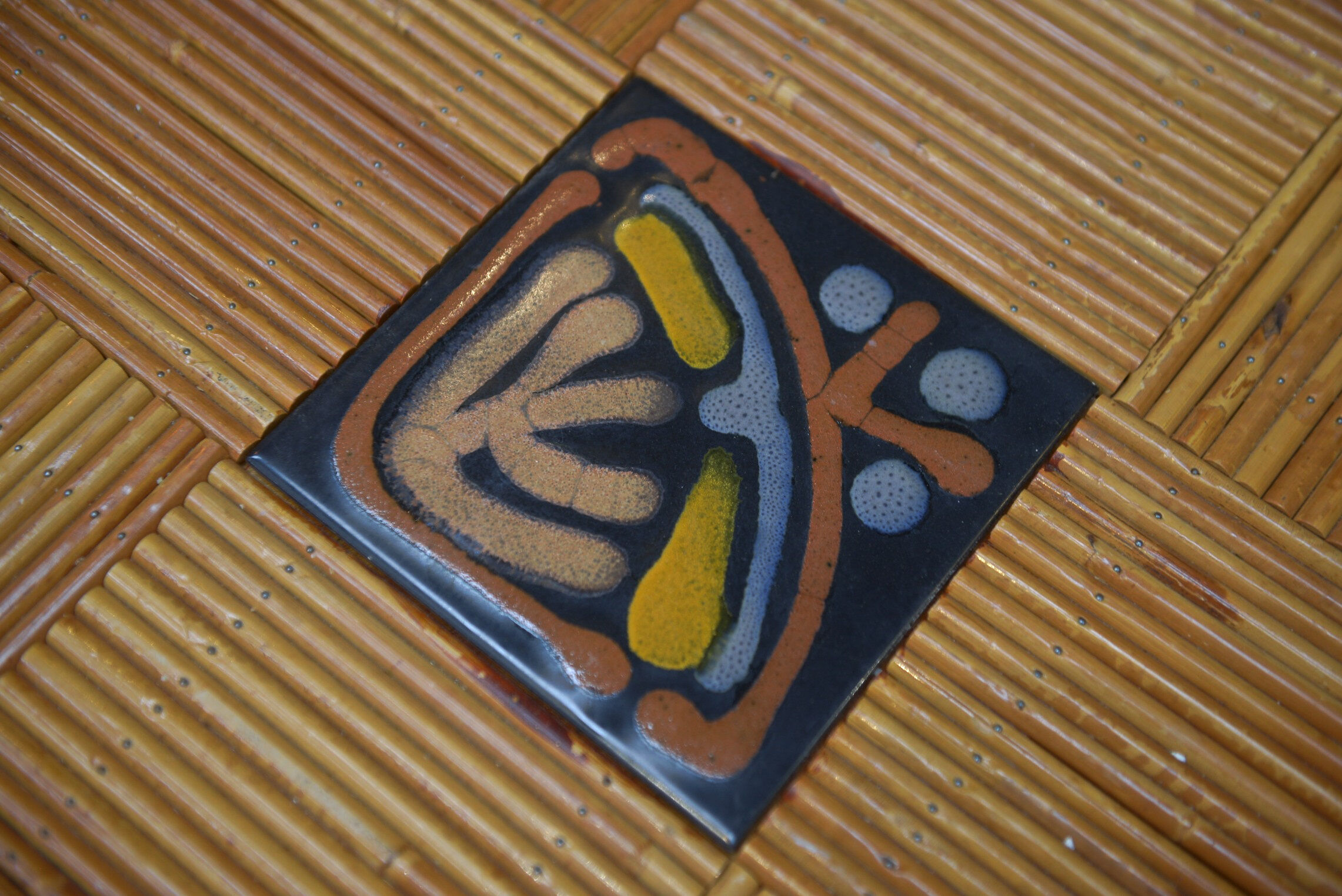 Rattan and ceramic table 1960