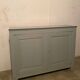 Antique vintage two-door sideboard in cloud gray