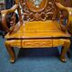 Pair of Asian armchairs in carved wood with mother-of-pearl inlays.