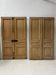 Pair of Haussmann-style double passage doors in patinated oak from the 19th century.
