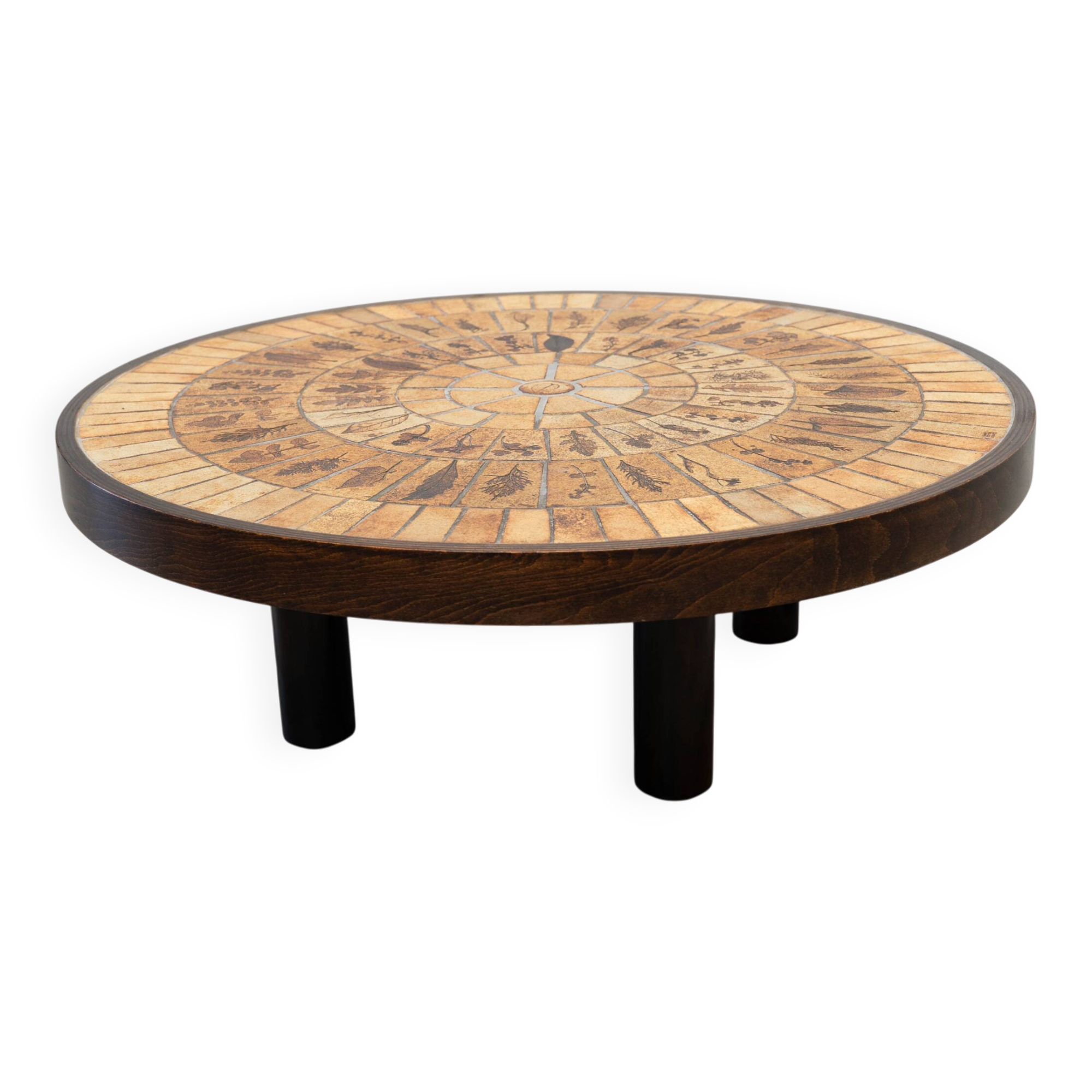 Round coffee table by Roger Capron