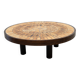 Round coffee table by Roger Capron