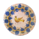 Faience dish decorated with yellow bird on a blue background