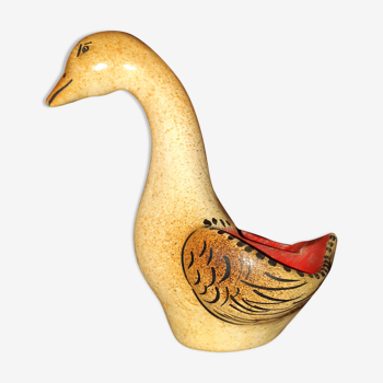 Old saltron painted in ceramic in the shape of a swan