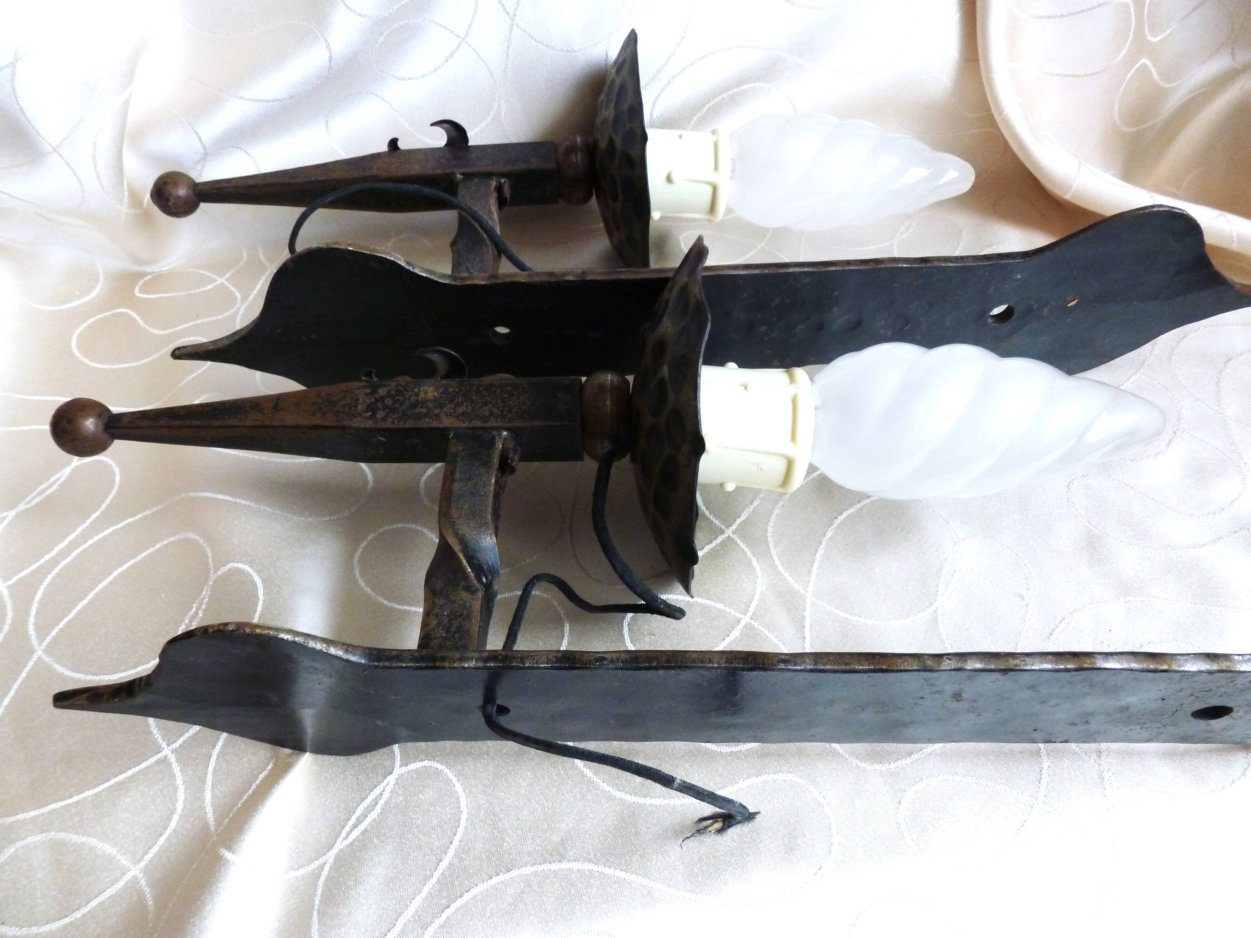 Medieval wrought iron wall lights / antique medieval lighting.