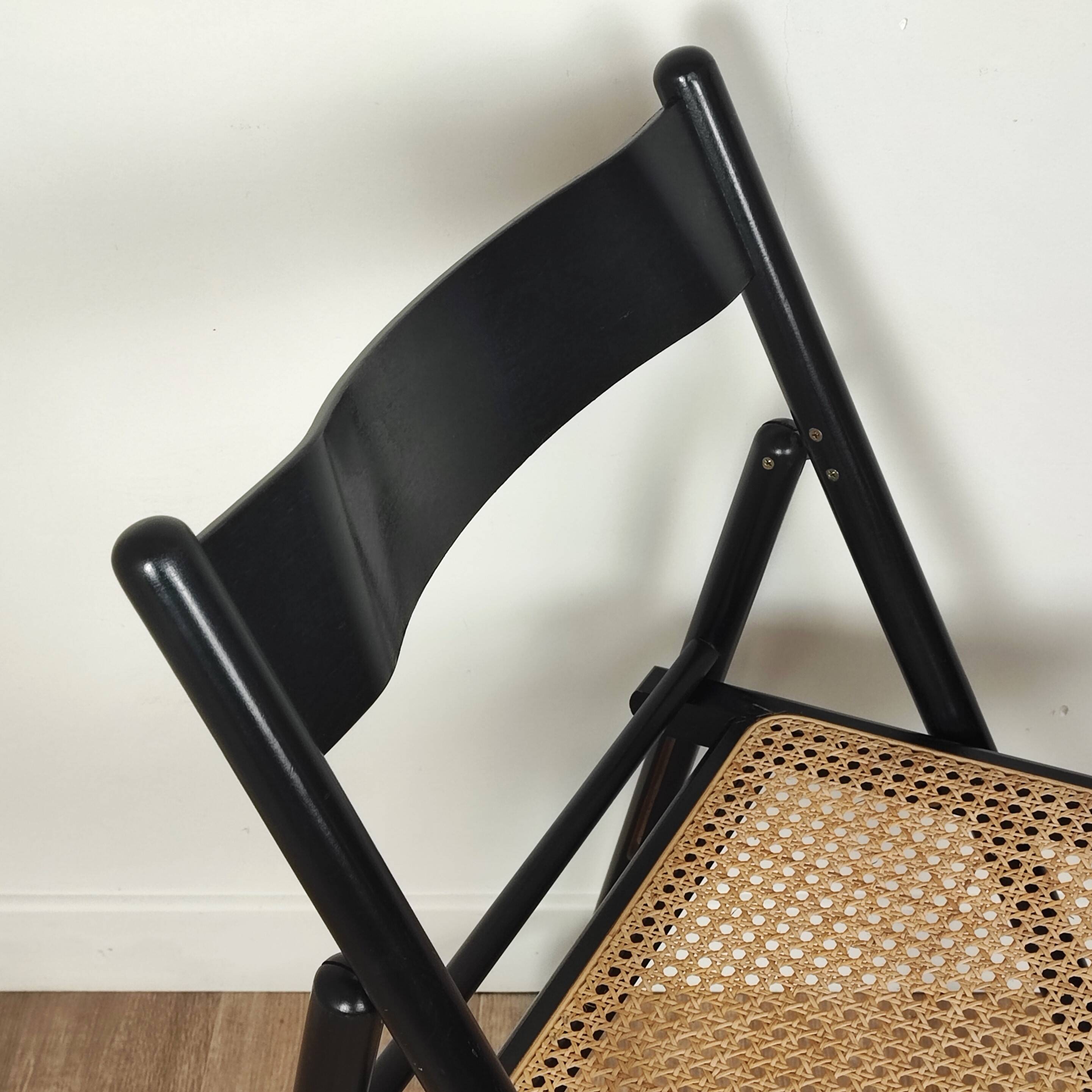 Pair of wooden and rattan folding chairs