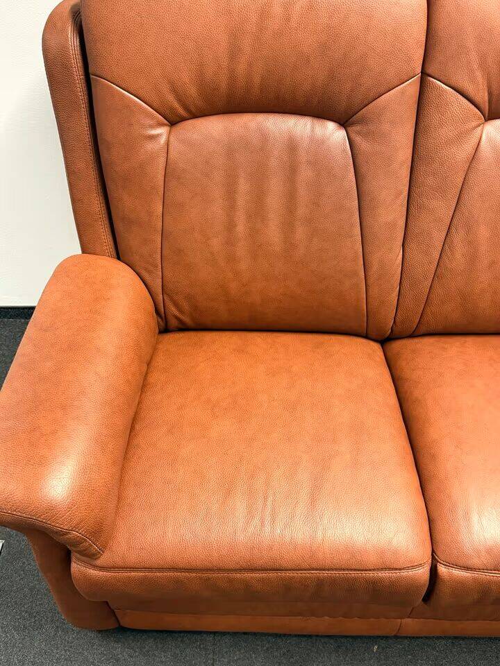 Leather  2-piece set-sofa and armchair from Elastoform