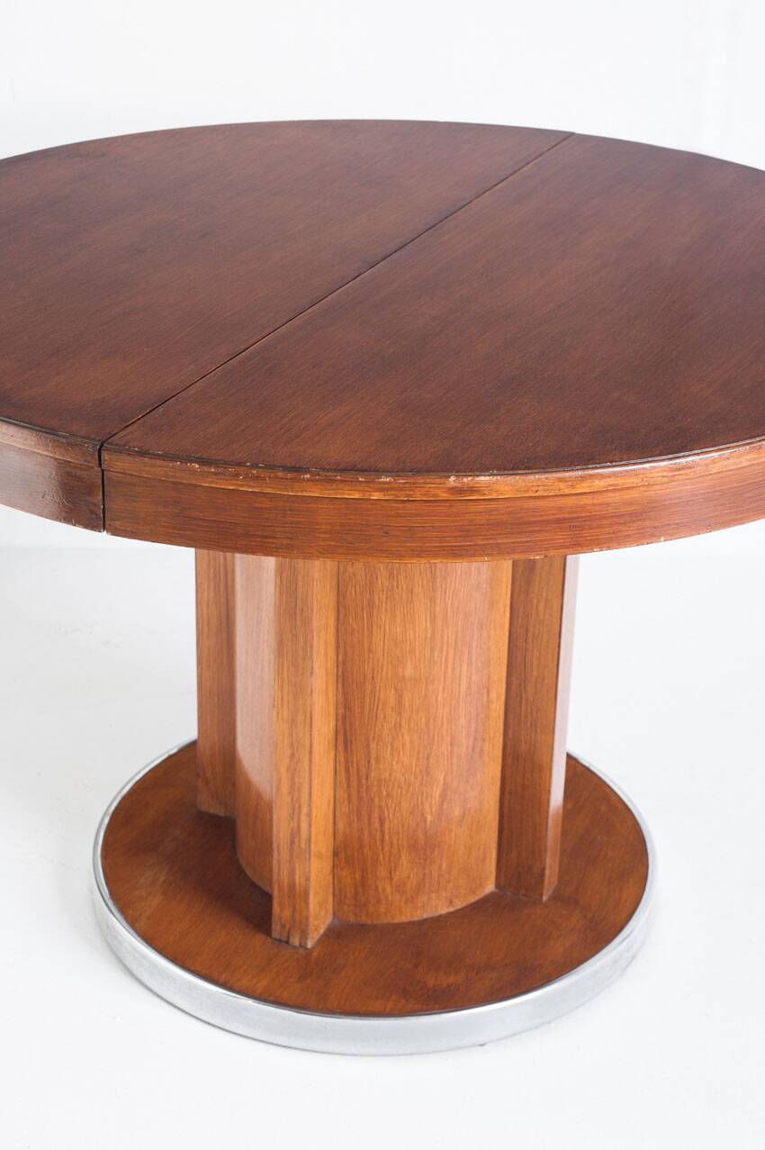 Dining table with a central extension. Vintage. Art Deco style. Varnished wood. France, 1960s.