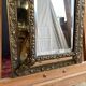 Napoleon III style mirror with gilt brass side panels