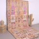 Tapis marocain vintage en laine berbère pêche