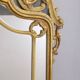 MIROIR MURAL DU DÉBUT DU XXE SIÈCLE EN BOIS DORÉ DE STYLE BAROQUE
