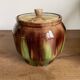 Glazed terracotta covered pot