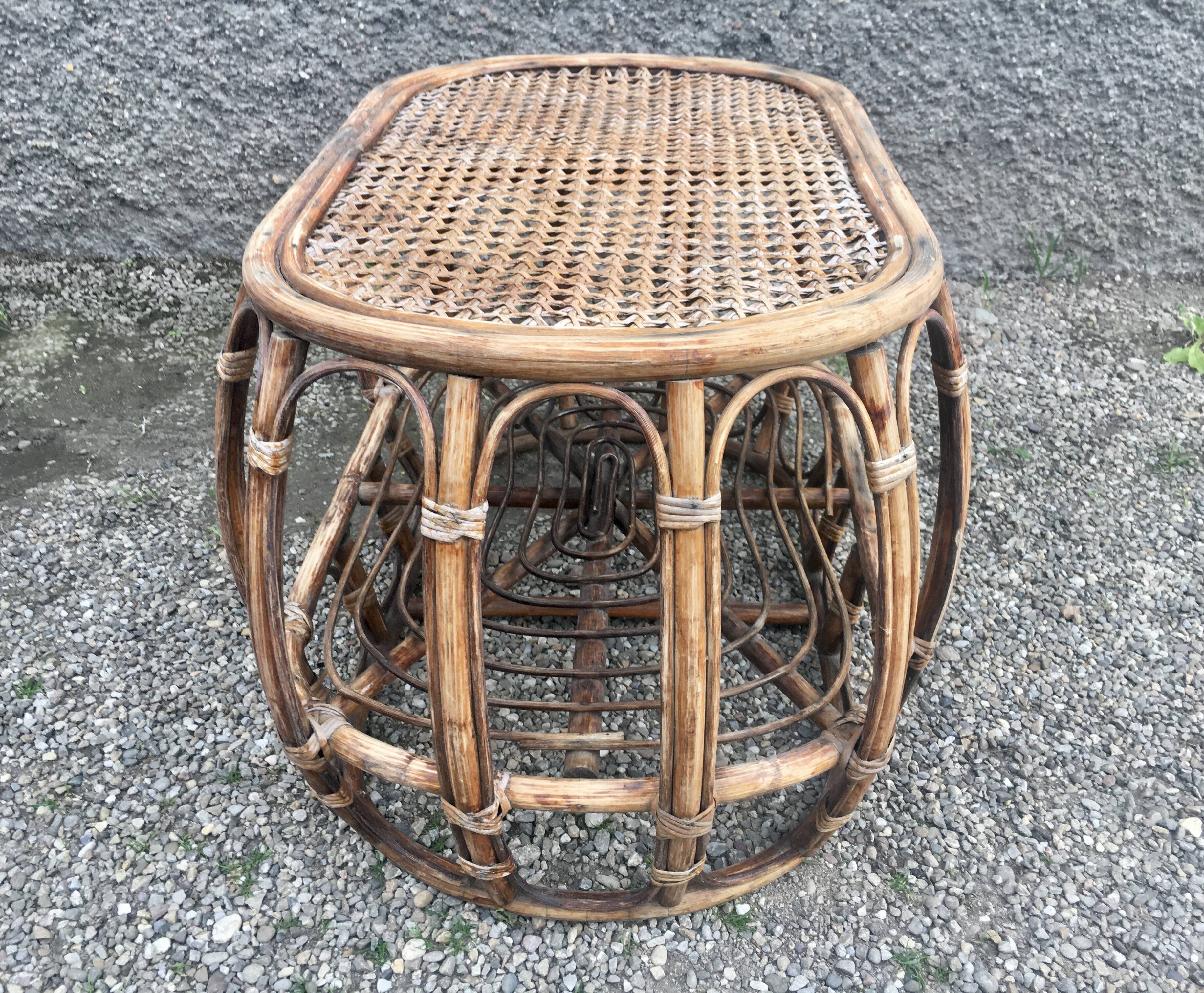 Pair of rattan armchairs and vintage oval table