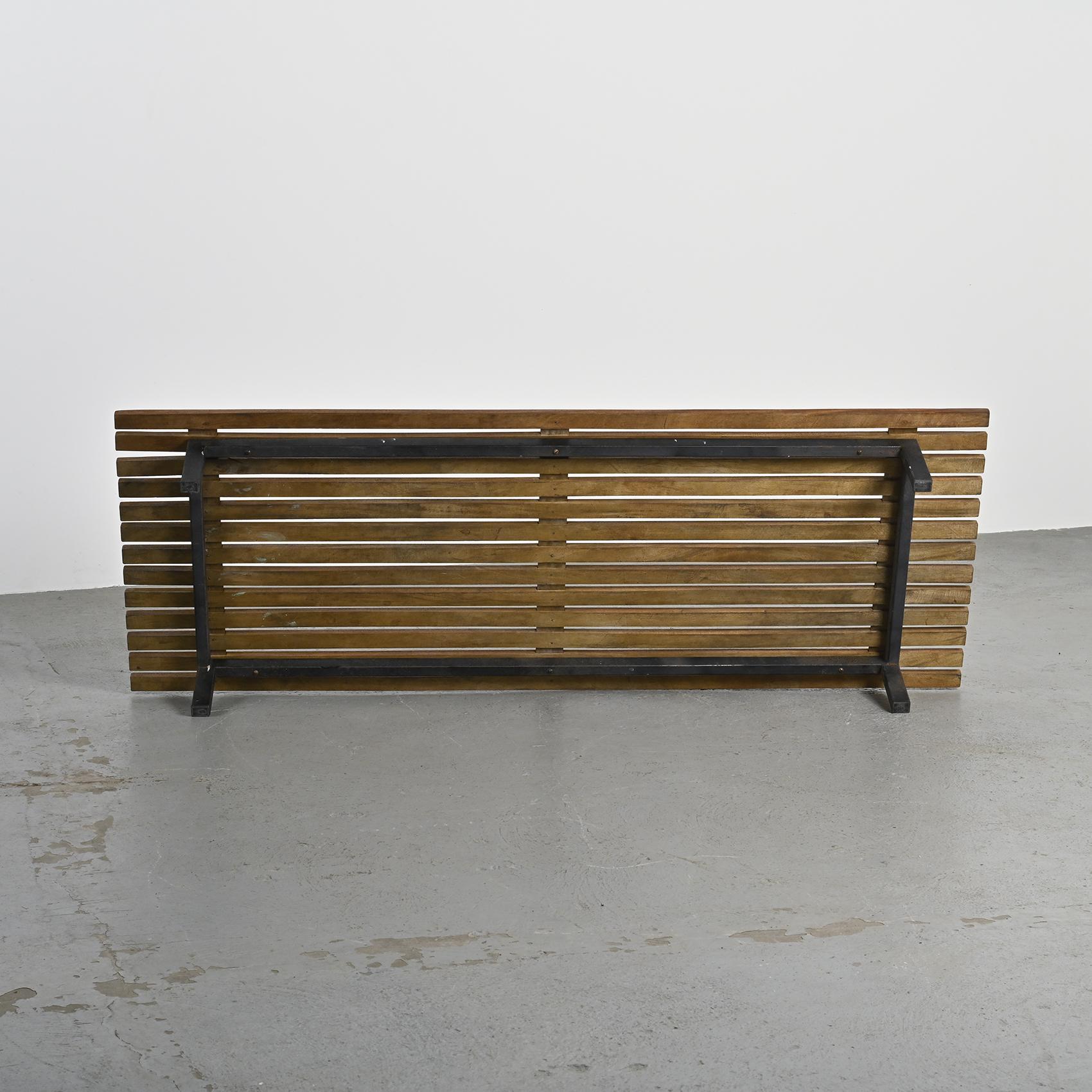 Cansado mahogany bench by Charlotte Perriand, circa 1962.