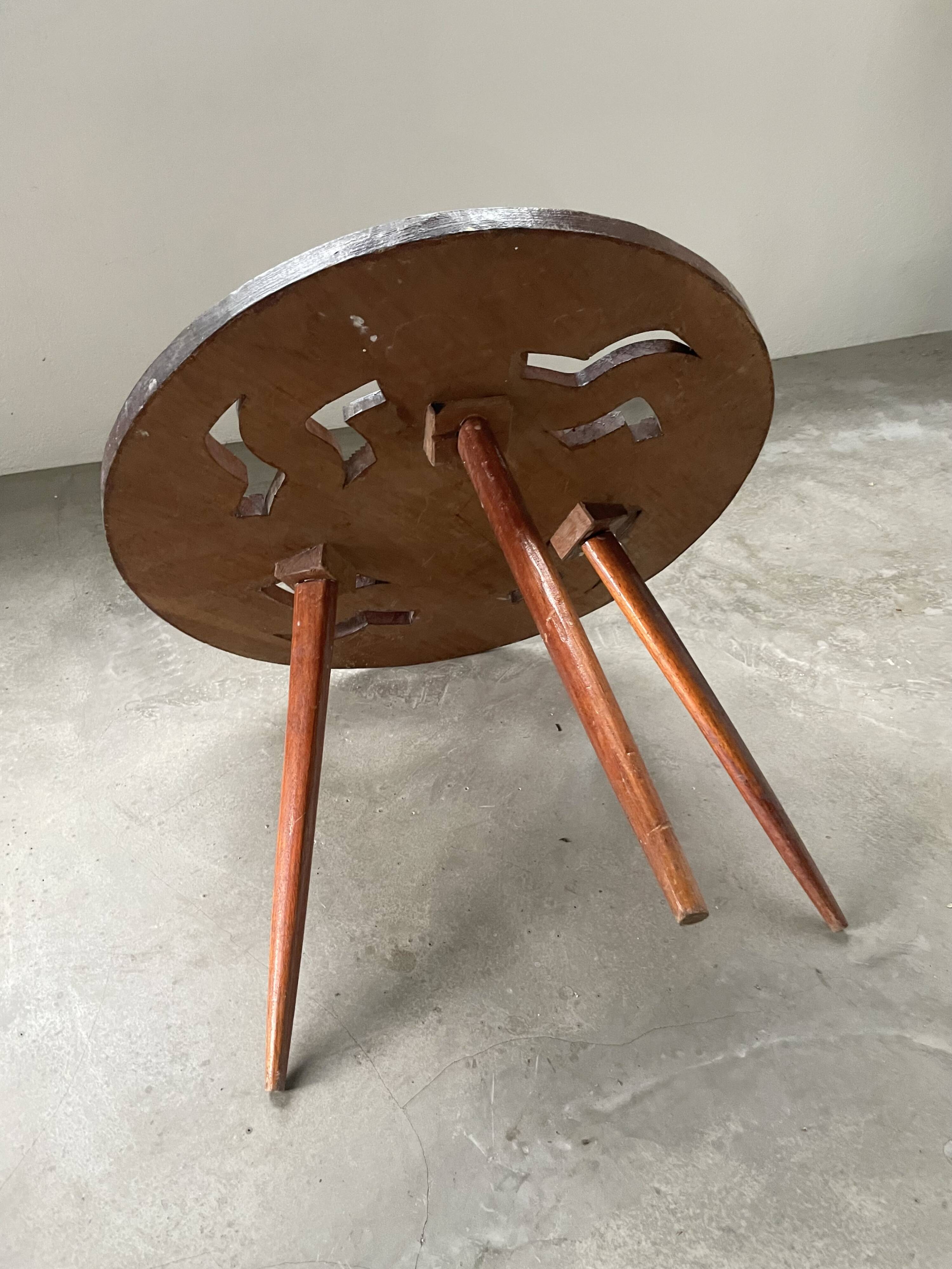 60s tripod coffee table in chiseled wood