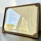 Metal frame in gold colored brass