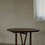 Round table with a tilting top from a 19th-century provincial French winemaker in oak.