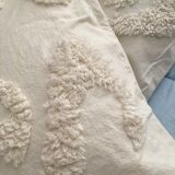 Duo of berber beige cushions