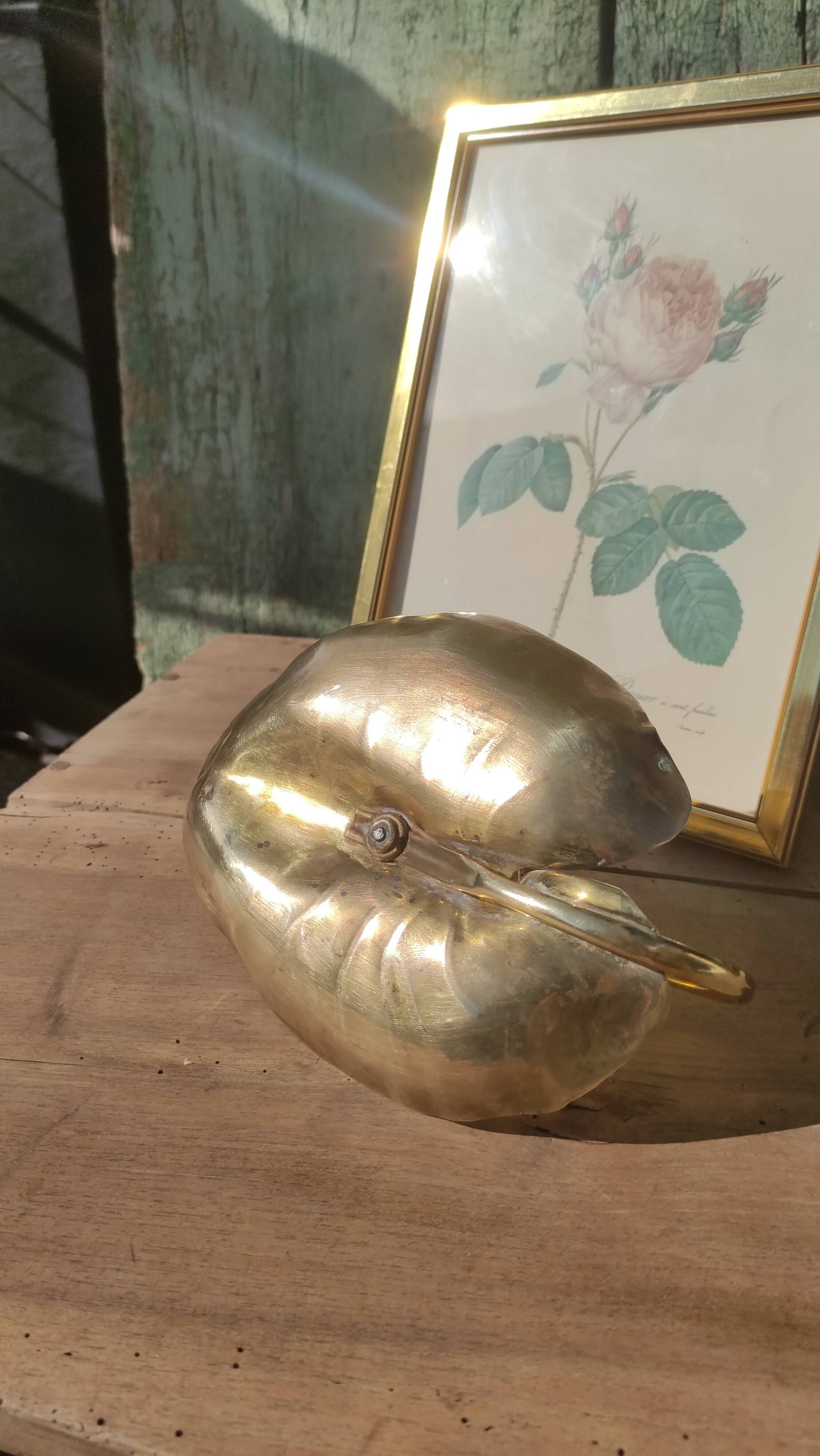 Vintage candle holder in golden brass