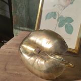Vintage candle holder in golden brass