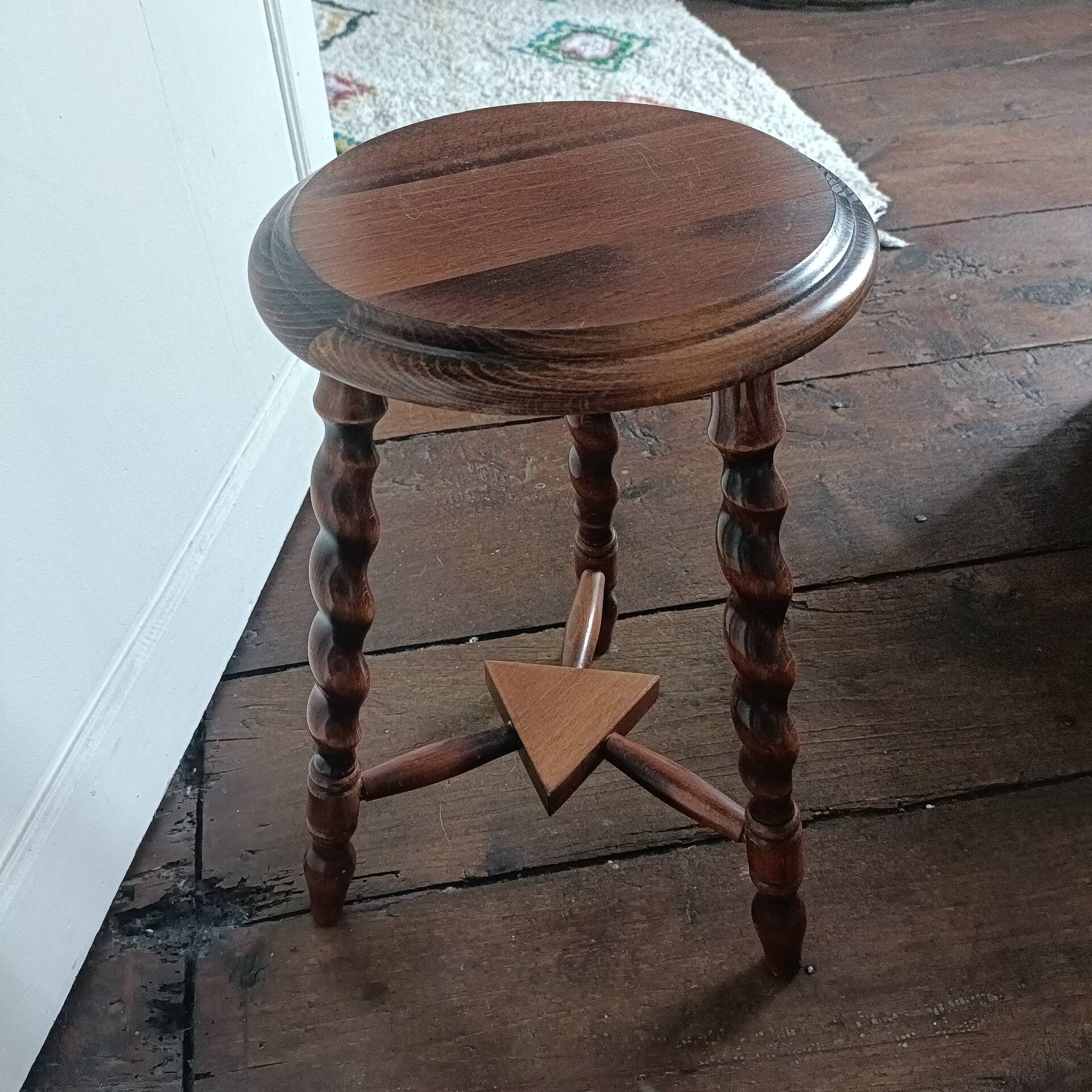 Tripod stool with turned legs