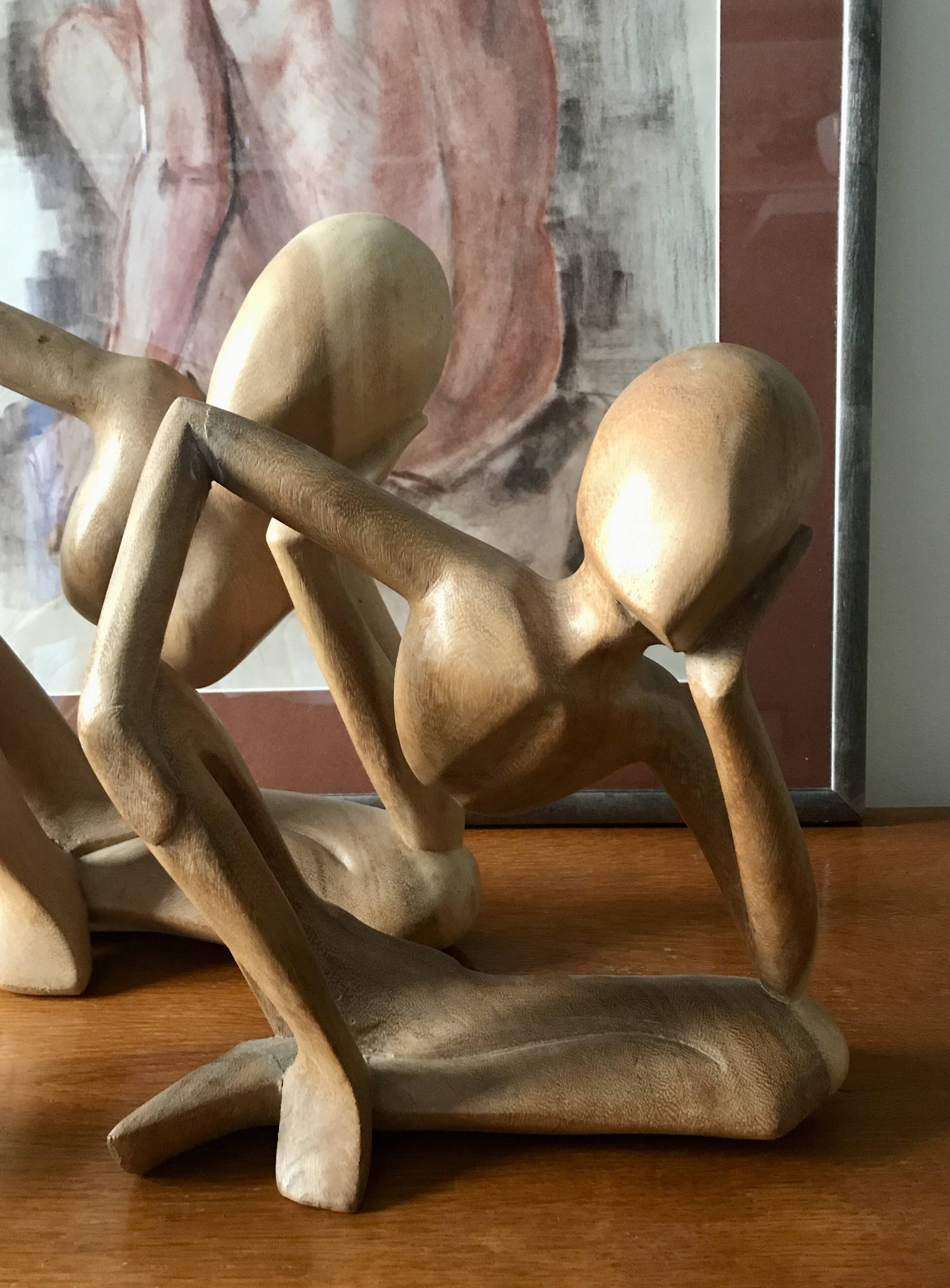 Pensive man wooden statue