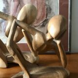 Pensive man wooden statue