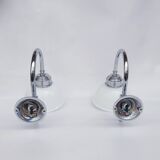 Swan neck and white glass wall lights